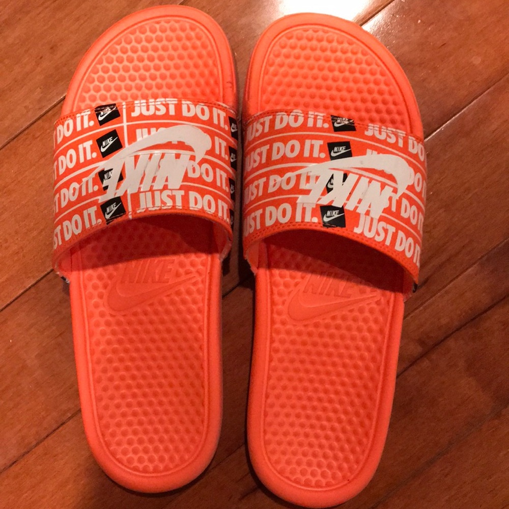 Nike “Just Do It” collection orange slides
